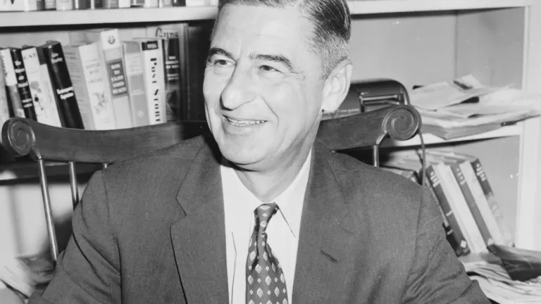 Theodor Geisel, Dr. Seuss, seated at his desk