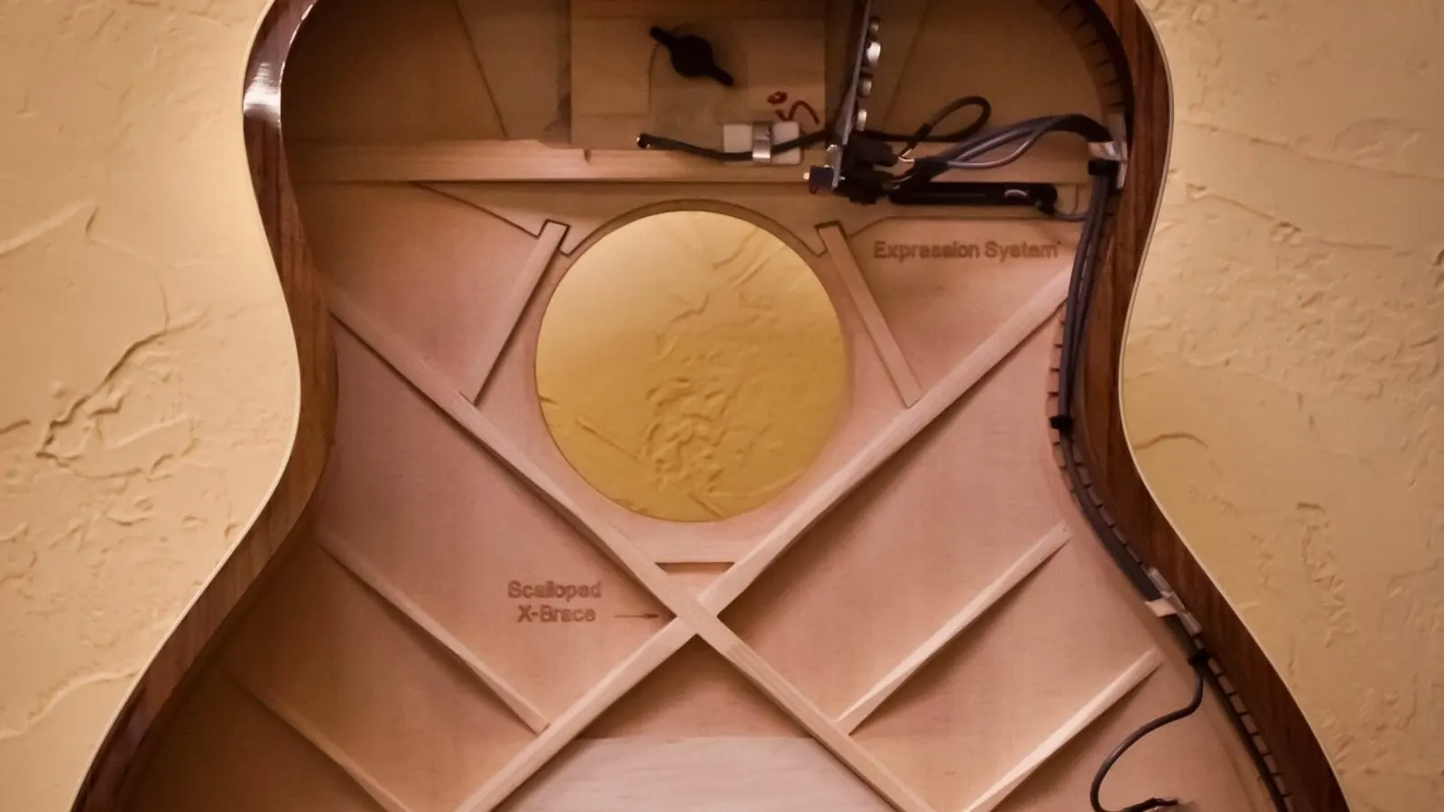 Interior of an acoustic guitar on display at the Taylor Guitars factory in El Cajon